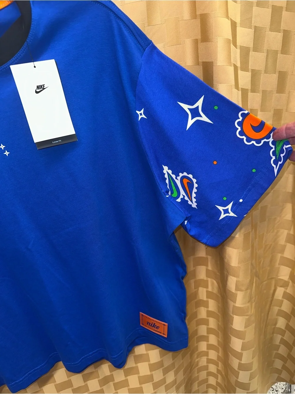 Nike Royal Blue Short-Sleeve Graphic Tee with Orange Accents
